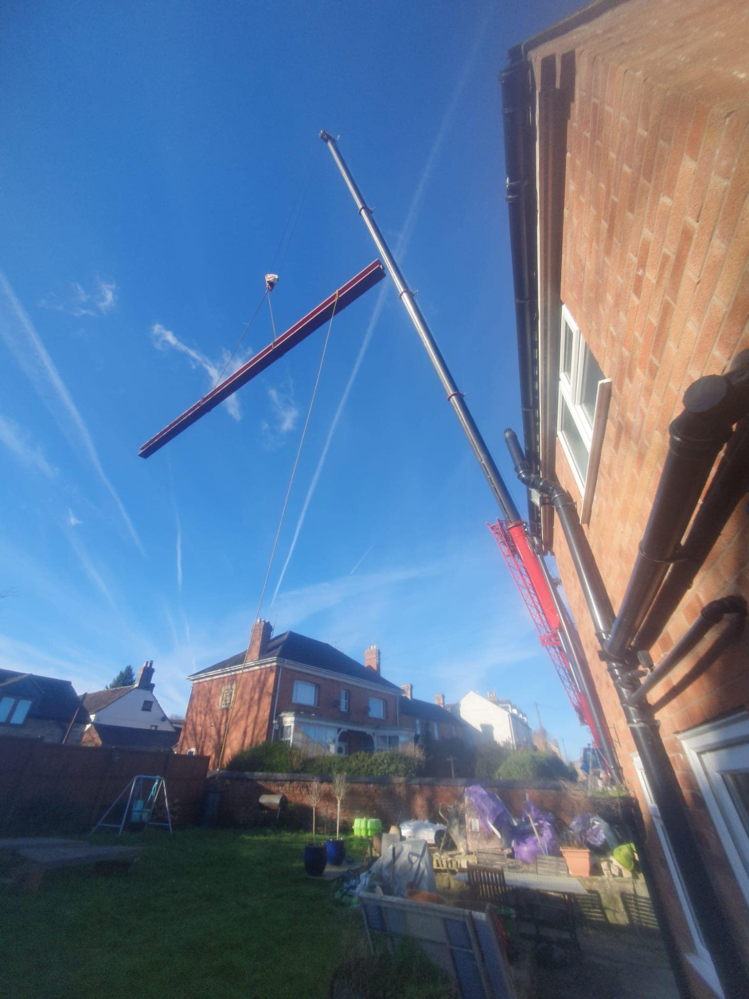 Our Demag AC100/4L placing steel beams, near Dursley, Gloucestershire